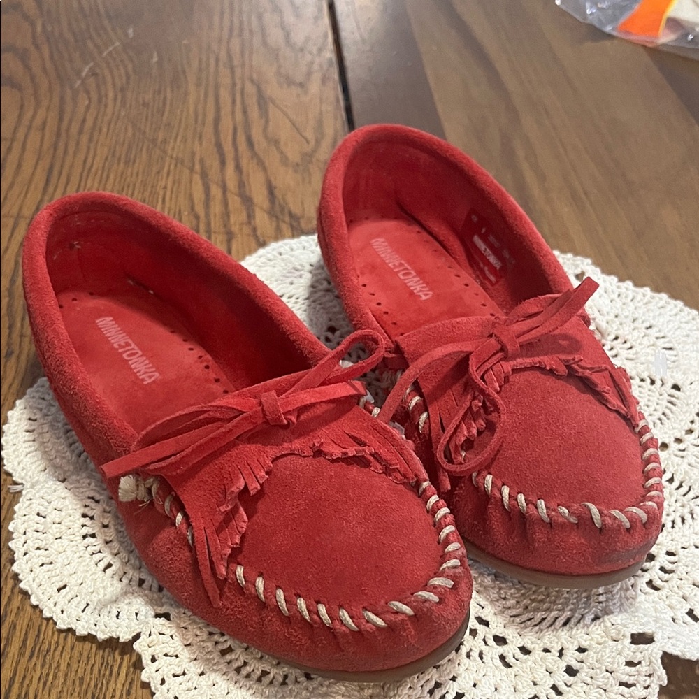 Minnetonka are Kitty hard soul Moccasins in Vibrant Red